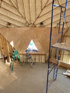 Plywood walls at living room window