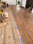 Wood flooring in the living/dining room.